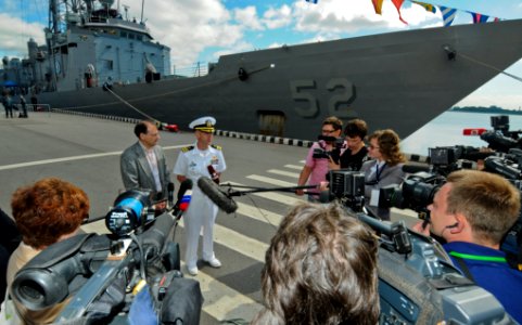 US Navy 110628-N-OM642-399 Cmdr. Patrick E. Kulakowski, commanding officer of the guided-missile frigate USS Carr (FFG 52), speaks with Russian med