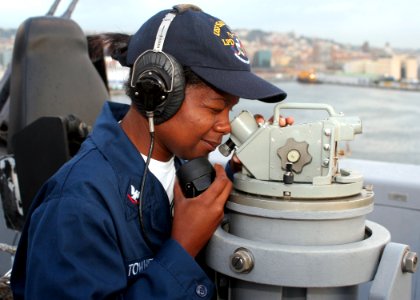 US Navy 080916-N-6764G-043 Quartermaster 3rd Class Atiya Townes stands port lookout watch aboard the amphibious transport dock ship USS San Antonio (LPD 17)