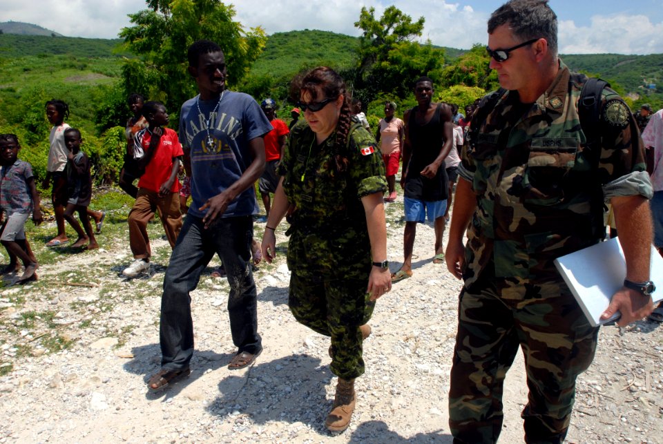 US Navy 080918-N-3595W-473 Joint medical personnel assigned to the amphibious assault ship USS Kearsarge (LHD 3) continue medical assessments in Haiti while the ship resupplies at Naval Station Guantanamo Bay, Cuba