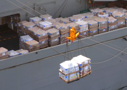 US Navy 110519-N-SG869-758 Supplies are transferred from the Military Sealift Command fast combat support ship USNS Bridge (T-AOE 10) to the aircra