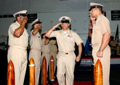 US Navy 080916-N-7282P-005 Chief Aviation Boatswain's Mate (Fuels) Angel Pomales becomes the first chief petty officer to be pinned on Sept. 16, 2008