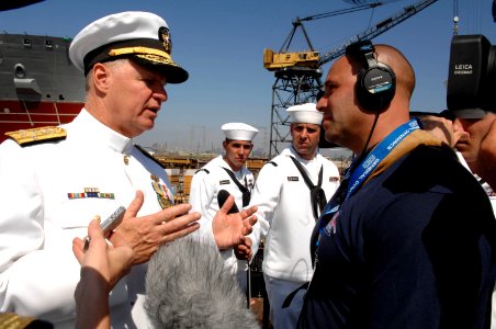 US Navy 080918-N-8273J-187 Chief of Naval Operations (CNO) Adm. Gary Roughead speaks with media at the conclusion of the christening and launch ceremony of USNS Carl Brashear (T-AKE 7) at General Dynamics NASSCO shipyard