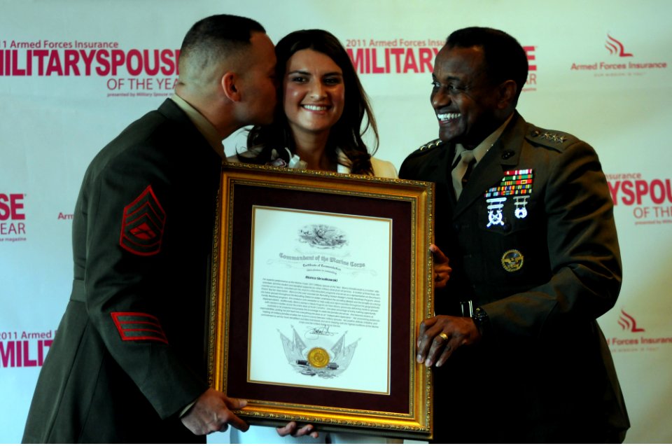 US Navy 110505-N-AD372-169 Bianca Strzalkowski receives the 2011 Military Spouse of the Year award
