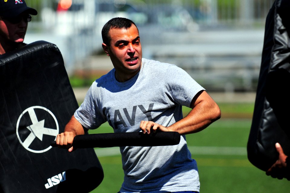 US Navy 080919-N-0807W-115 Ensign Jalon Fonseca, assigned to the mine countermeasure ship USS Patriot (MCM 7), fights off two attackers with a baton
