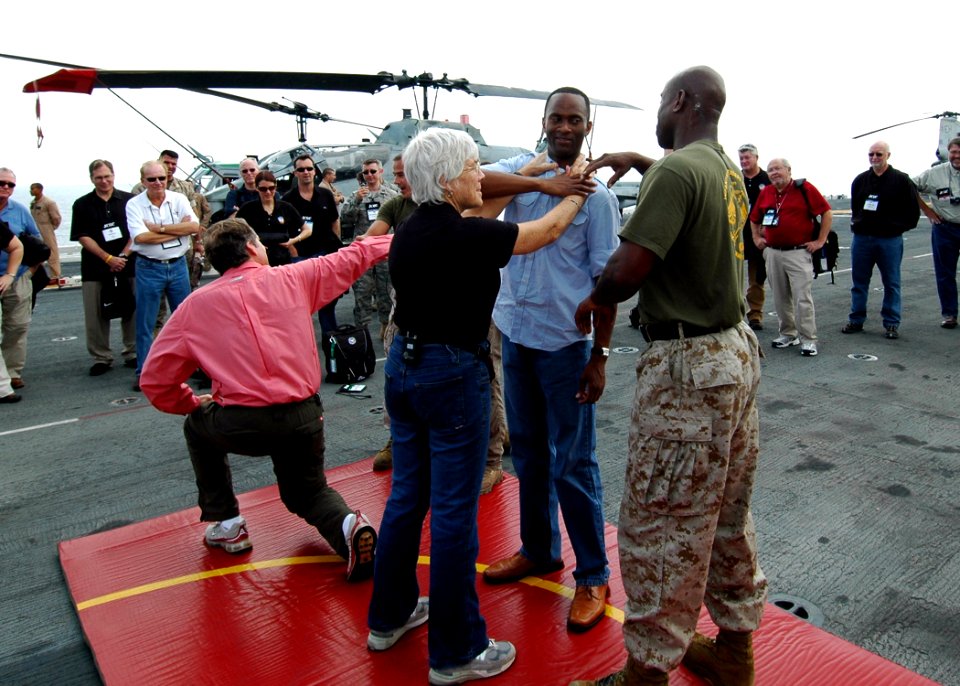 US Navy 080921-N-4236E-114 Marines assigned to the 26th Marine Expeditionary Unit (26 MEU) demonstrate hand-to-hand combat techniques for visitors from the Joint Civilian Orientation Conference