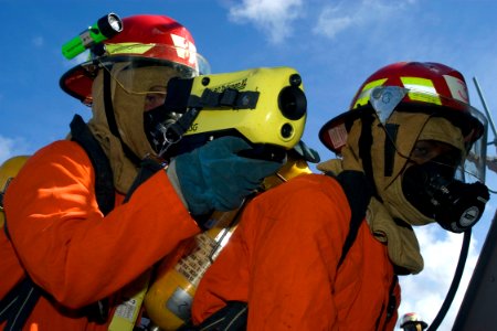 US Navy 080917-N-9123L-003 Seaman John Lennon uses the naval infrared thermal imager to search for hot spots