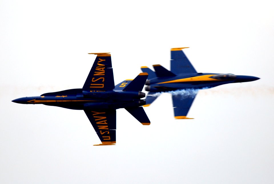 US Navy 080920-N-5345W-123 Two solo F-A-18C Hornets from the Blue Angels perform a high speed crossing maneuver