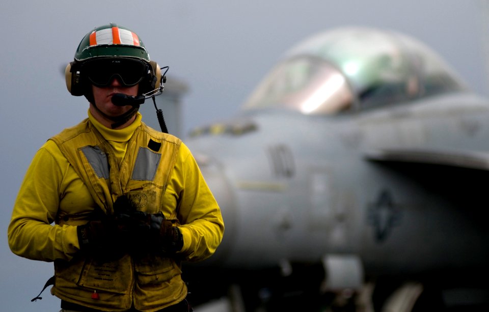 US Navy 110403-N-6320L-014 Lt. Cmdr. Matthew Obrian waits to launch an F-A-18F Super Hornet aboard USS Carl Vinson (CVN 70)