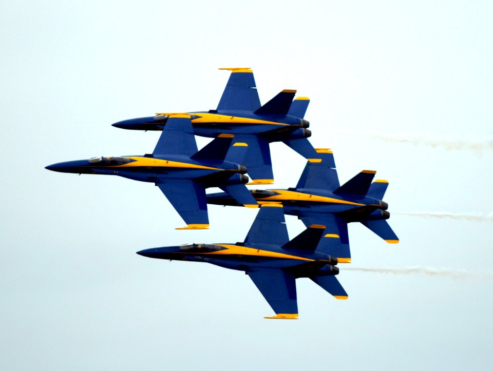 US Navy 080920-N-5345W-105 Four F-A-18C Hornet from the Blue Angels fly in the familiar diamond formation