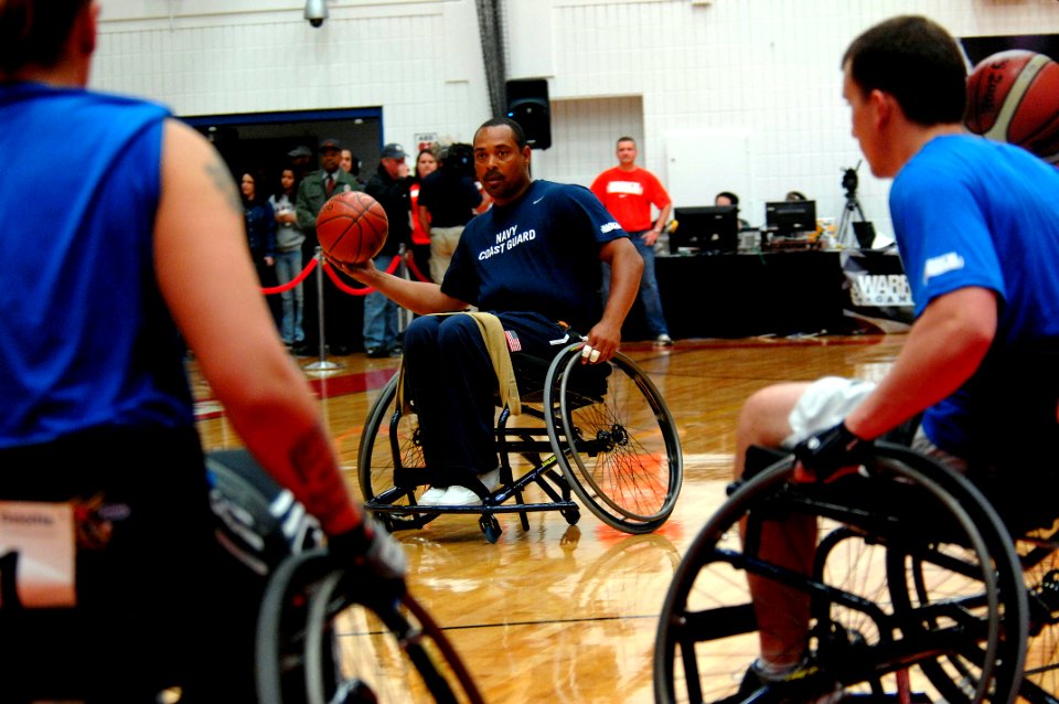 US Navy 110520-N-CD297-154 Boatswain's Mate 1st Class Andre C. Shelby, a member of Team Navy-Coast Guard, plays against Air Force for a bronze meda