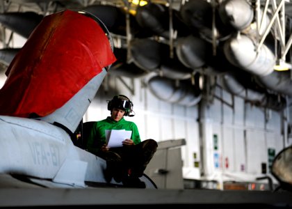 US Navy 080921-N-7241L-005 Aviation Electronics Technician 2nd Class Scott Nottingham, assigned to the