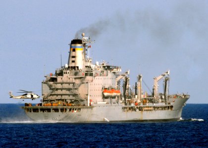US Navy 080922-N-9134V-040 An MH-60S Sea Hawk from Helicopter Sea Combat Squadron (HSC) 26 conducts a vertical replenishment with the Military Sealift Command fleet replenishment oiler USNS Laramie (T-AO 203)
