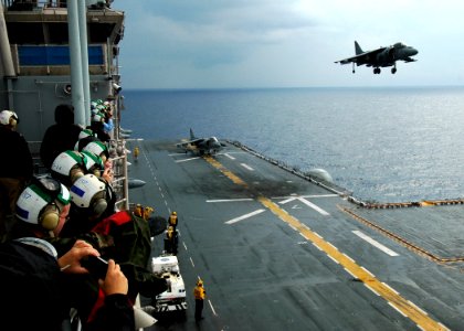 US Navy 080921-N-4236E-188 Distinguished visitors from the Joint Civilian Orientation Conference (JCOC) watch an AV-8B Harrier from Marine Medium Helicopter Squadron (HMM) 264 perform a vertical take-off