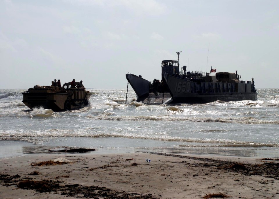 US Navy 080923-N-0193M-272 Beach Master Unit (BMU) 2 departs the beach in Galveston aboard a landing craft utility