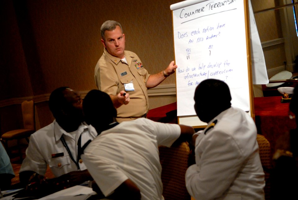 US Navy 080922-N-9818V-472 Command Master Chief of the Naval War College Bill Peterson participates in a regional group seminar