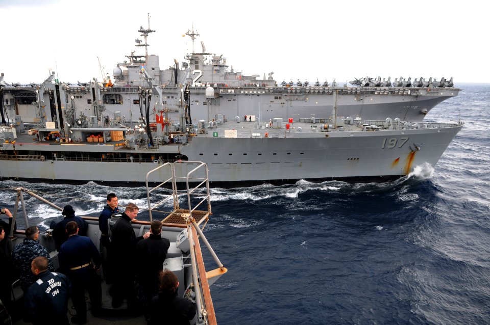 US Navy 110131-N-6692A-191 USS Essex (LHD 2), left, and USNS Pecos (T-AO 197), center, are underway alongside USS Denver (LPD 9)