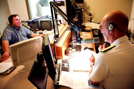 US Navy 080924-N-3271W-019 Rear Adm. John W. Goodwin is interviewed by Keven Cohen on WVOC AM 560 radio