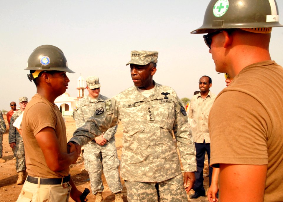US Navy 080923-N-3560G-025 Construction Electrician Constructionman Apprentice Nara Eim greets General William Ward