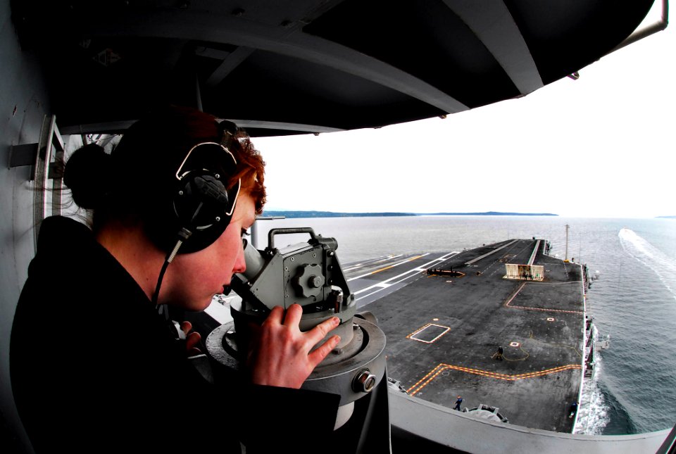 US Navy 080923-N-2610F-143 Quartermaster Seaman Shauna McDade uses an alidade navigation device to take bearing measurements