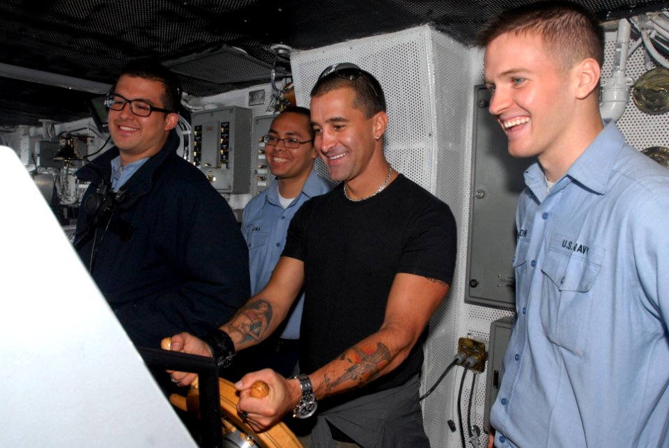US Navy 080925-N-4995K-111 Seaman Anthony Lugo , Seaman Eric Acuna and Seaman Scott Hibdon watch as Scott Stapp takes the helm