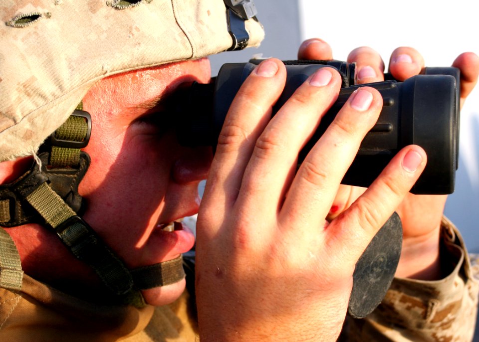 US Navy 080923-N-6764G-033 Lance Cpl. Joel Vandentoorn scans the horizon while transiting the Suez Canal