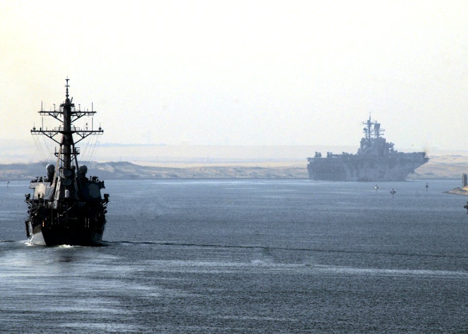 US Navy 080923-N-9134V-161 The guided-missile destroyer USS Ramage (DDG 61) and the multi-purpose amphibious assault ship USS Iwo Jima (LHD 7) transit the Suez Canal
