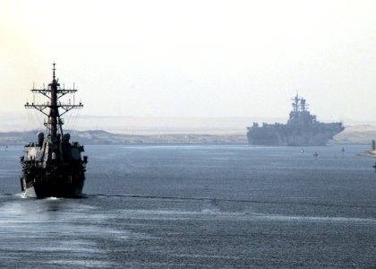 US Navy 080923-N-9134V-161 The guided-missile destroyer USS Ramage (DDG 61) and the multi-purpose amphibious assault ship USS Iwo Jima (LHD 7) transit the Suez Canal