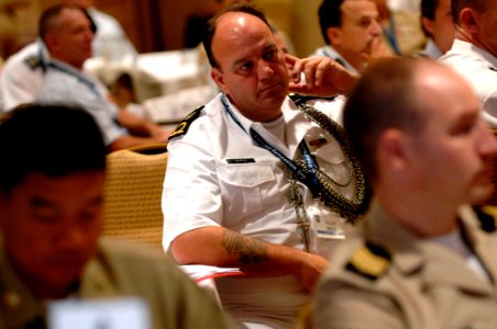 US Navy 080923-N-9818V-001 Royal Netherlands Navy Warrant Officer Jules Bree listens to presentations during the second Global Maritime Senior Enlisted Sailor Symposium