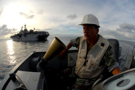 US Navy 080924-N-3595W-024 Chief Boatswain's Mate Carl Lemouis heads for Gonaives to offload disaster relief supplies