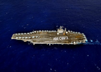 US Navy 080927-N-7981E-800 ailors assigned to the aircraft carrier USS Abraham Lincoln (CVN 72) and Carrier Air Wing (CVW) 2 participate in a photo