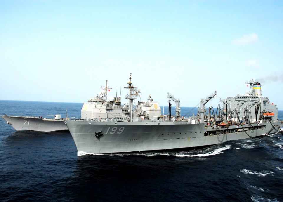 US Navy 080923-N-2183K-038 The Military Sealift Command fleet replenishment oiler USNS Tippecanoe (T-AO 199) and the guided-missile cruiser USS Cape St. George (CG 71) steam alongside amphibious assault ship USS Peleliu (LHA 5)