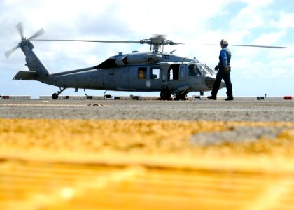 US Navy 080929-N-5148B-040 An MH-60S Sea Hawk prepares to launch from the amphibious assault ship USS Peleliu (LHA 5)