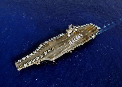 US Navy 080927-N-7981E-806 Sailors assigned to the aircraft carrier USS Abraham Lincoln (CVN 72) and Carrier Air Wing (CVW) 2 participate in a photo