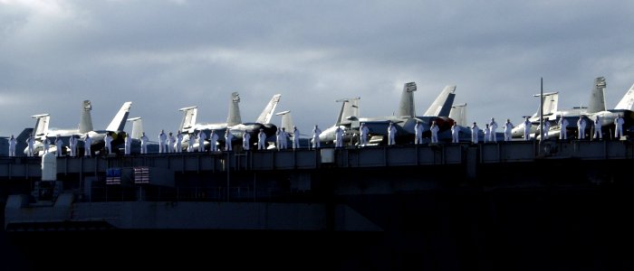US Navy 080930-N-0879R-002 Sailors man the rails of the Nimitz-class aircraft carrier USS Abraham Lincoln (CVN 72)