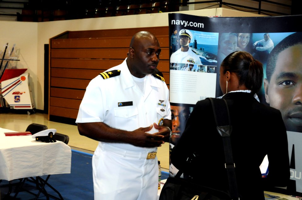 US Navy 080924-N-2539L-035 Lt. Derrick Mitchell talks about the many Navy opportunities with a South Carolina State University student