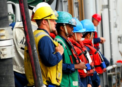 US Navy 081001-N-2183K-095 Crew members watch the fuel probe move to the guided-missile destroyer USS Halsey (DDG 97)