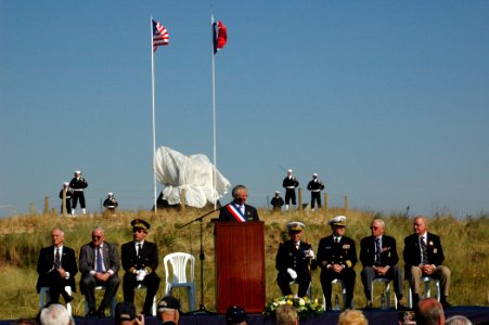 US Navy 080927-N-1429M-102 Saint Marie du Mont Mayor Henri Milet, delivers remarks at a U.S. Navy monument dedication ceremony for a U.S. Navy monument