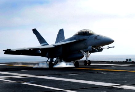 US Navy 080928-N-2610F-013 An F-A-18F Super Hornet lands on the flight deck of the Nimitz-class aircraft carrier USS John C. Stennis (CVN 74)