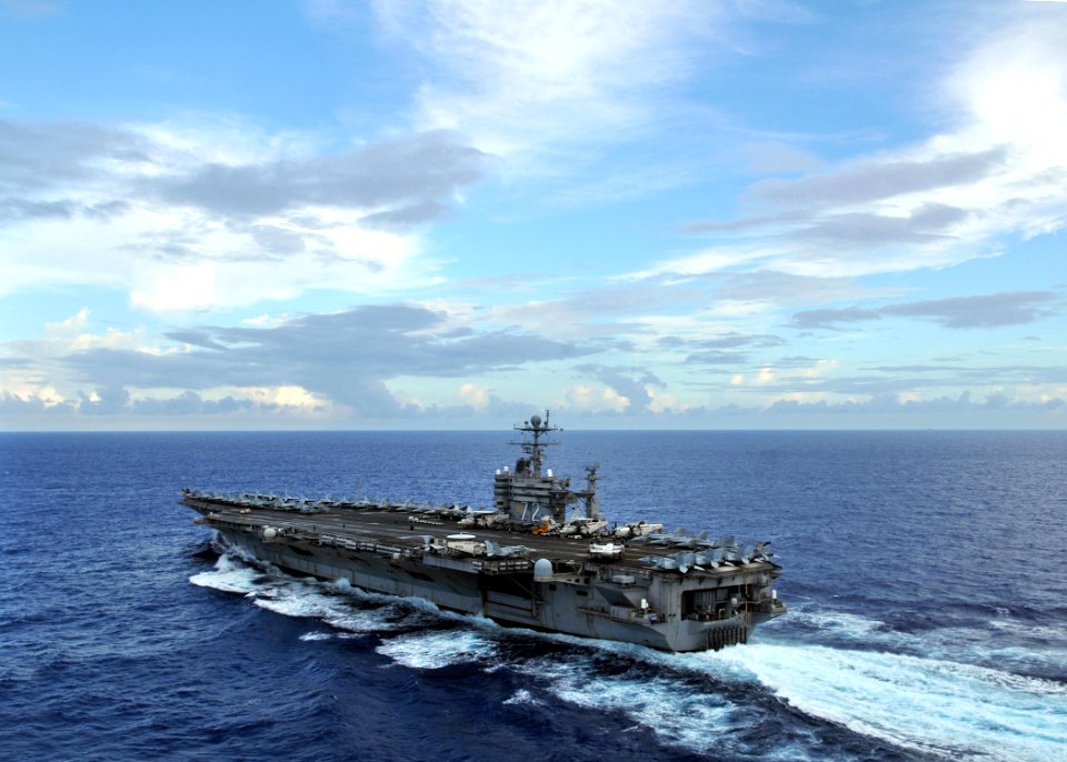 US Navy 080927-N-7981E-141 The aircraft carrier USS Abraham Lincoln (CVN 72) is underway as evening falls during a transit of the Pacific Ocean