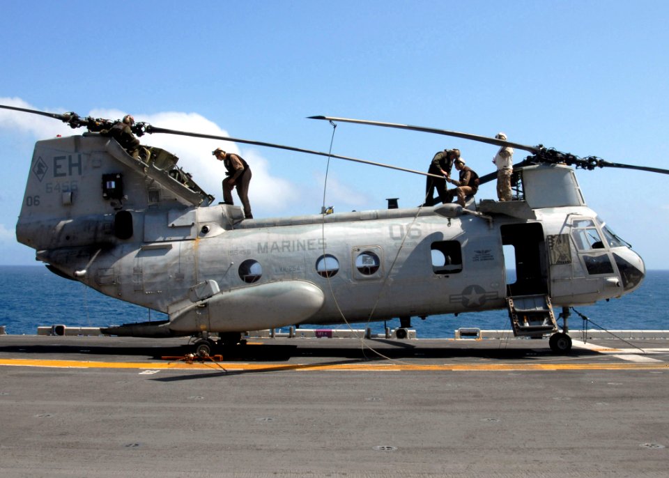 US Navy 081001-N-4856C-028 Marines perform maintenance on a CH-46 Sea Knight helicopter assigned to Marine Medium Helicopter Squadron (HMM) 264 aboard the multi-purpose amphibious assault ship USS Iwo Jima (LHD 7)