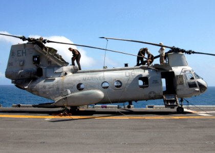 US Navy 081001-N-4856C-028 Marines perform maintenance on a CH-46 Sea Knight helicopter assigned to Marine Medium Helicopter Squadron (HMM) 264 aboard the multi-purpose amphibious assault ship USS Iwo Jima (LHD 7)