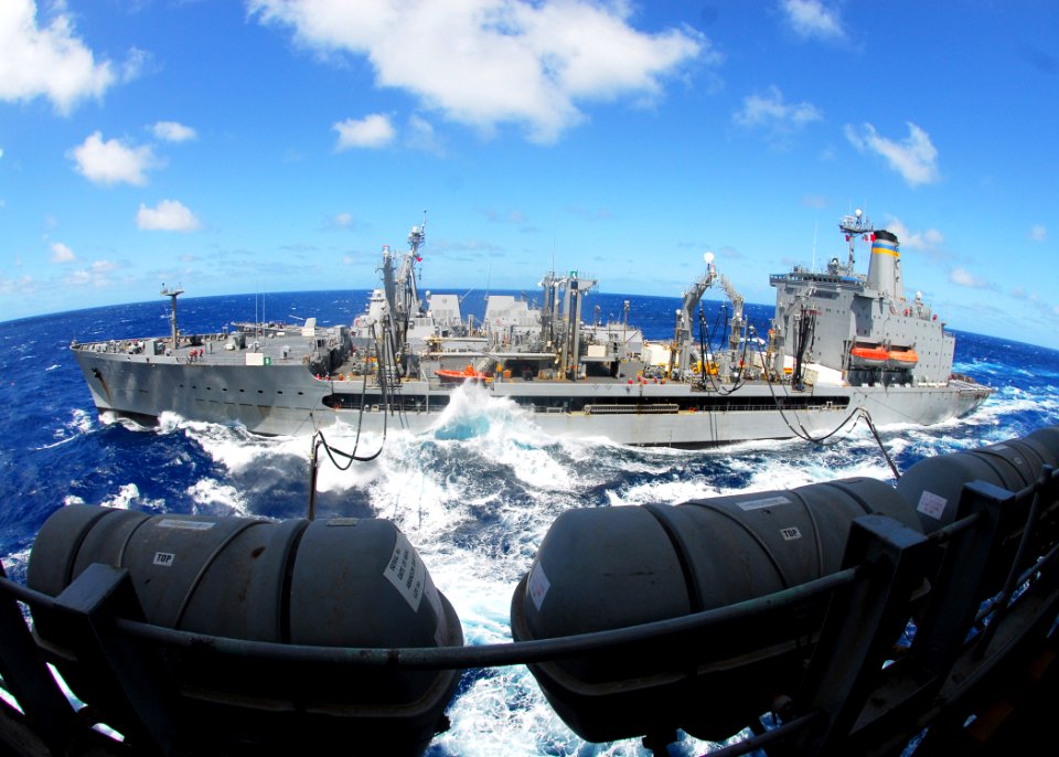 US Navy 080929-N-5148B-030 The Military Sealift Command fleet replenishment oiler USNS Pecos (T-A0 197) and the guided-missile destroyer USS Halsey (DDG 97) steam alongside the amphibious assault ship USS Peleliu (LHA 5)