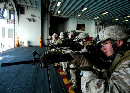 US Navy 081001-N-4236E-042 Marines assigned to the 26th Marine Expeditionary Unit (MEU) conduct a dry firing rehearsal during weapons training aboard the multi-purpose amphibious assault ship USS Iwo Jima (LHD 7)