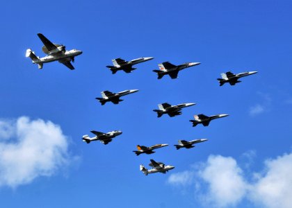 US Navy 080929-N-7981E-605 Aircraft assigned to Carrier Air Wing (CVW) 2 fly over the aircraft carrier USS Abraham Lincoln (CVN 72) in formation during an air power demonstration