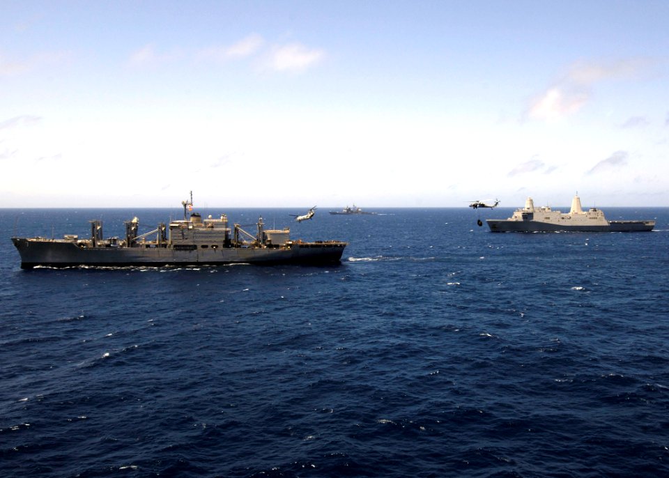 US Navy 081002-N-4236E-192 The Military Sealift Command combat stores ship USNS San Jose (T-AFS 7) conducts a vertical replenishment with the amphibious transport dock ship USS San Antonio (LPD 17) and the guided-missile cruise