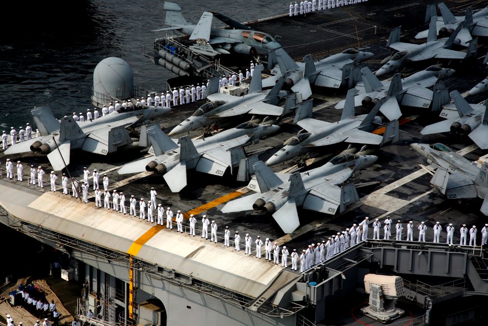 US Navy 080925-N-XXXXK-006 Sailors aboard the aircraft carrier USS George Washington (CVN 73) man the rails as they arrive at Fleet Activities Yokosuka, Japan
