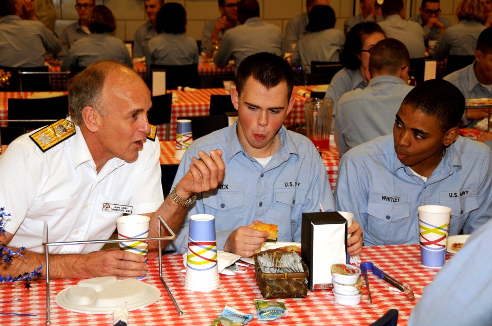 US Navy 081003-N-8848T-730 British Royal Navy Commodore Steve Kirby, commander for the Maritime Warfare School in Portsmith, England, speaks with recruits during a weekly