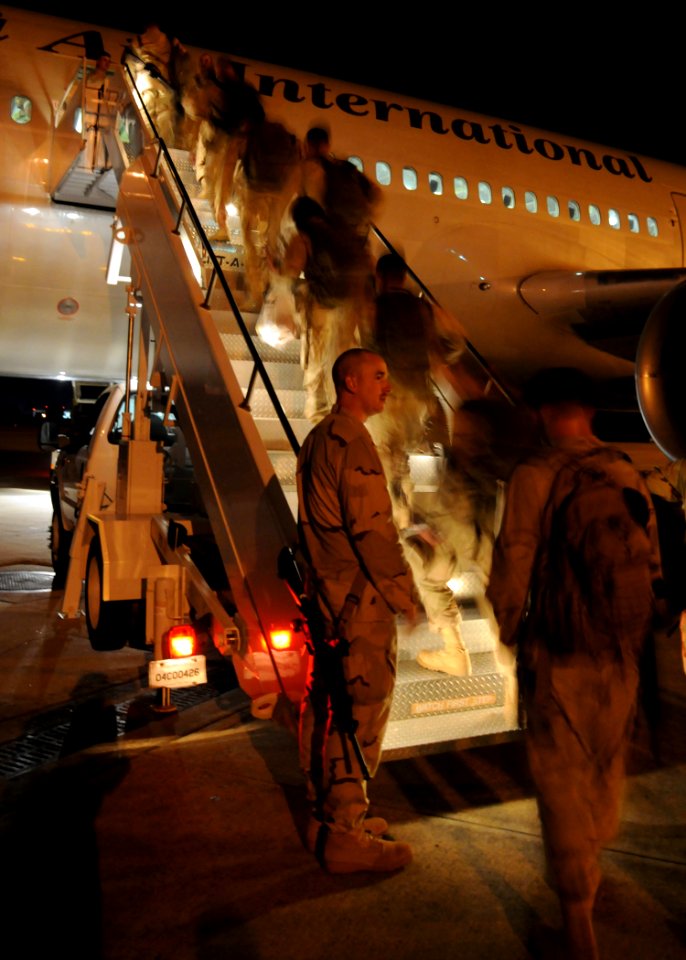 US Navy 080928-N-1120L-130 Seabees board their aircraft