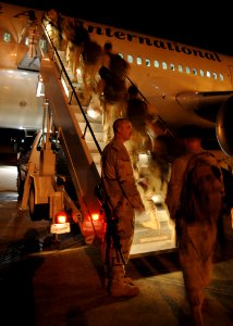 US Navy 080928-N-1120L-130 Seabees board their aircraft