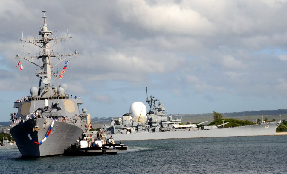 US Navy 081001-N-9758L-065 he Arleigh Burke-class guided-missile destroyer USS Russell (DDG 59) passes the Battleship Missouri Memorial